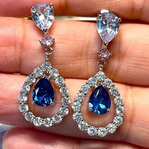 Pear shaped dangle earrings in silver and blue